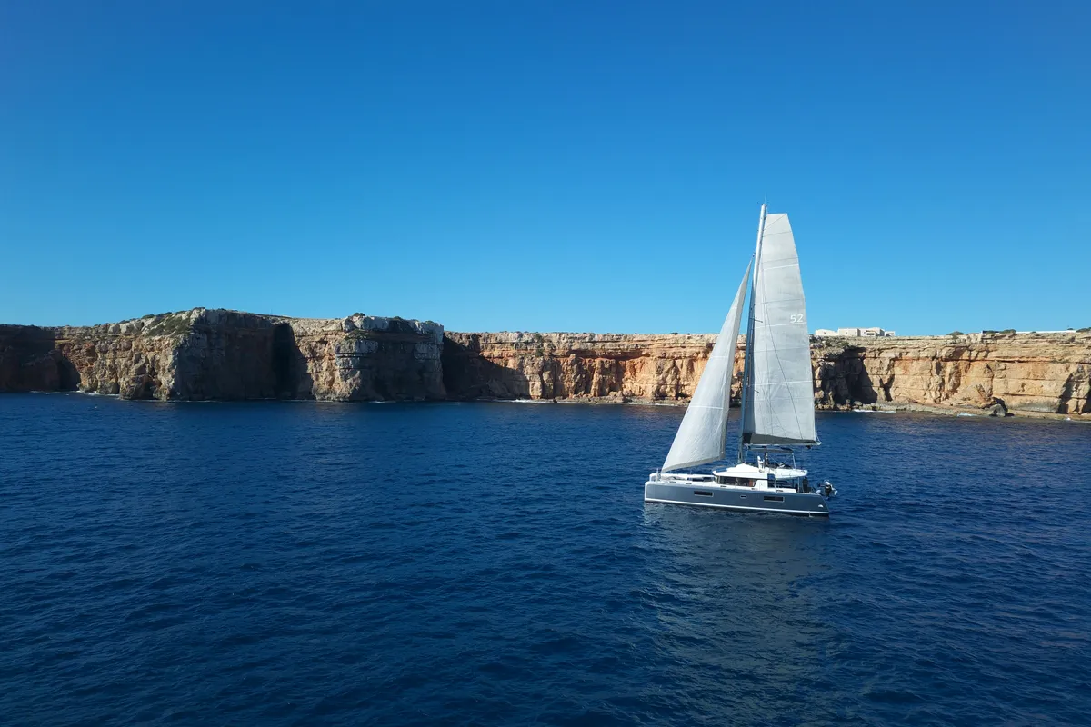 Exterior view of GOA 10, a Lagoon 52 catamaran at Santa Eulària des Riu, Spain