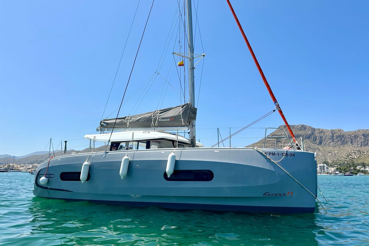 Exterior view of Floki, a Excess 11 catamaran at Port de Pollença, Spain