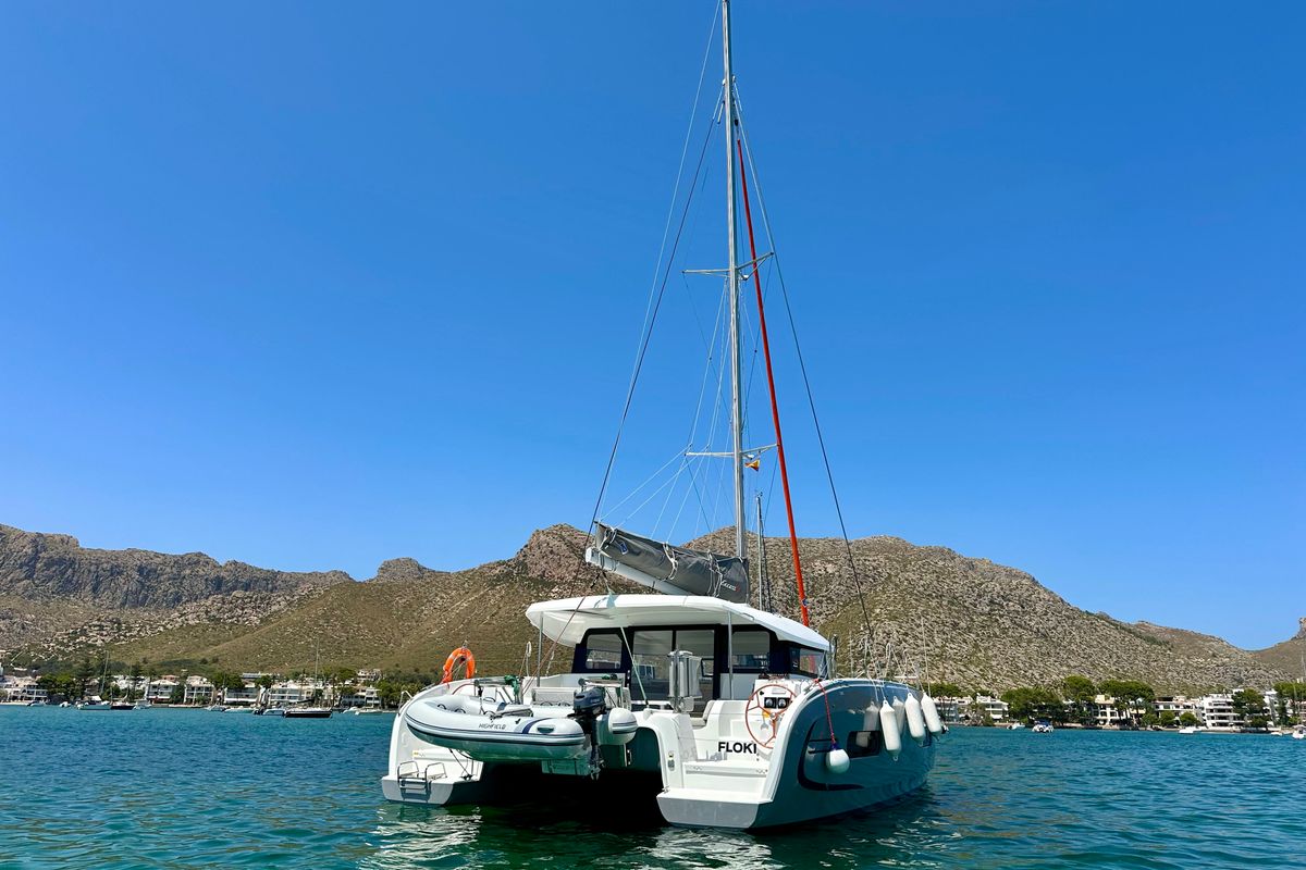 Exterior view of Floki, a Excess 11 catamaran at Port de Pollença, Spain