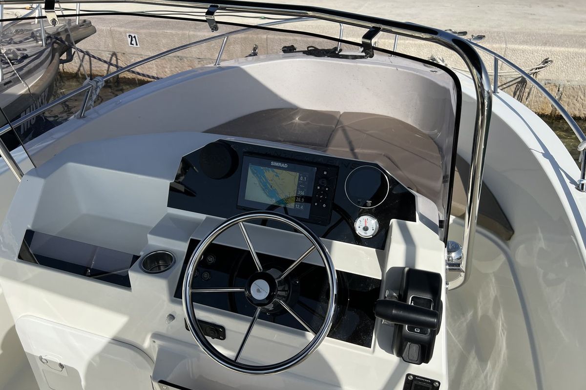 Cockpit of Atlantic Marine 530 - beige, a Atlantic Marine 530 motorboat at Grad Biograd na Moru, Croatia