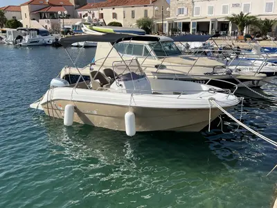 Exterior view of Atlantic Marine 530 - beige, a Atlantic Marine 530 motorboat at Grad Biograd na Moru, Croatia