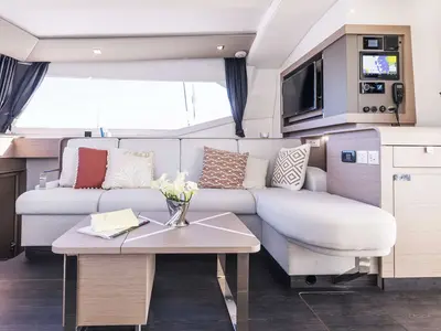 Salon of The Big Leboatski, a Fountaine Pajot Aura 51 catamaran at Belize City, Belize