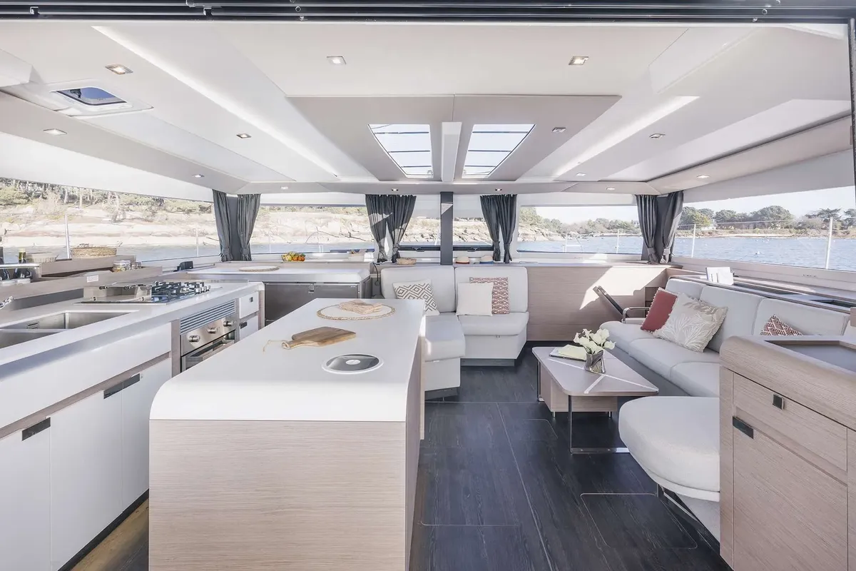 Salon of The Big Leboatski, a Fountaine Pajot Aura 51 catamaran at Belize City, Belize