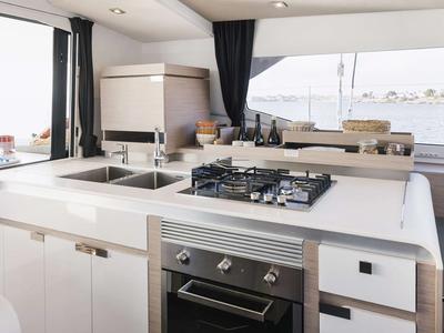 Galley of The Big Leboatski, a Fountaine Pajot Aura 51 catamaran at Belize City, Belize