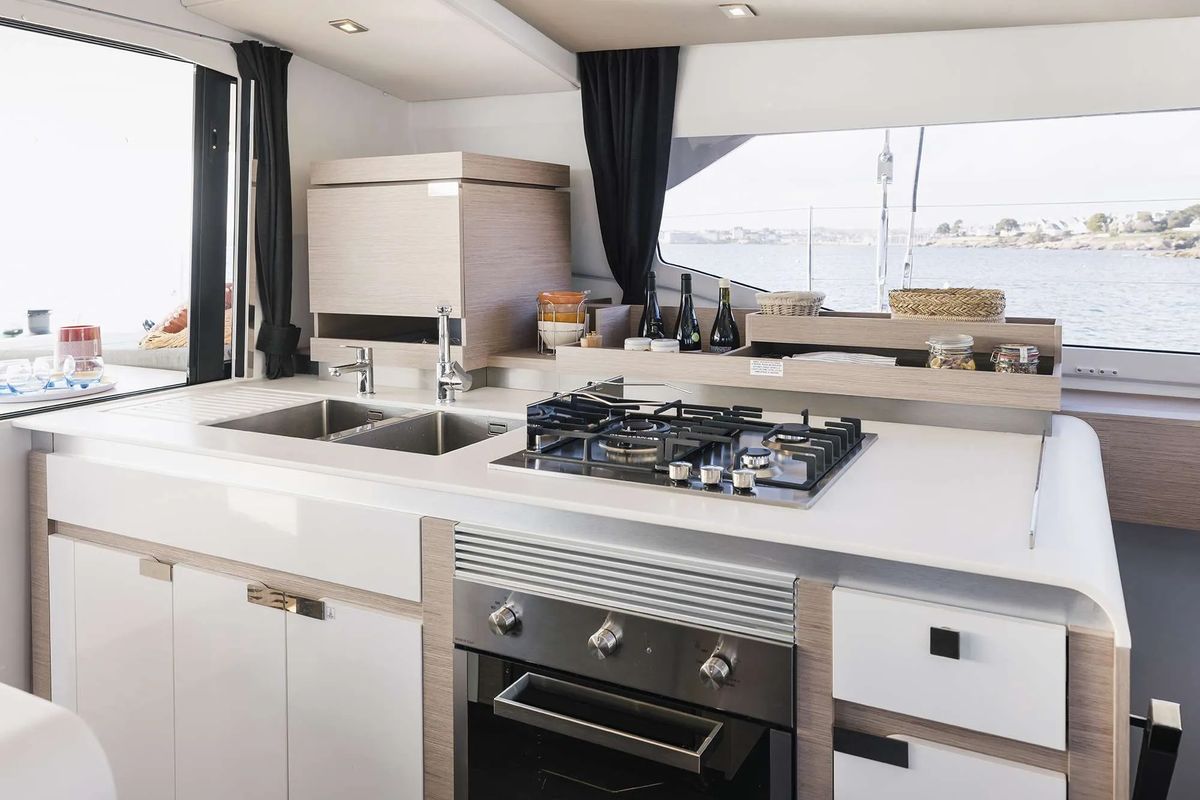 Galley of The Big Leboatski, a Fountaine Pajot Aura 51 catamaran at Belize City, Belize