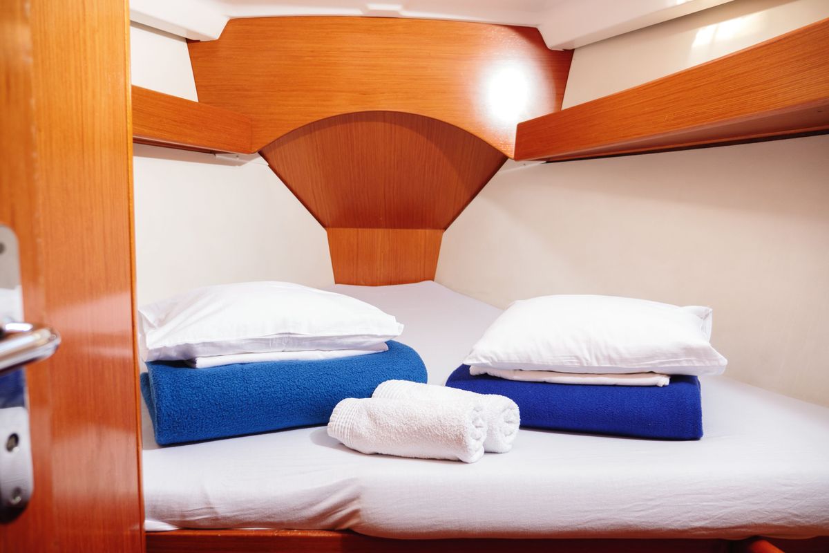 Cabin on Port Royal, a Jeanneau Sun Odyssey 449 sailboat at Rogač, Croatia