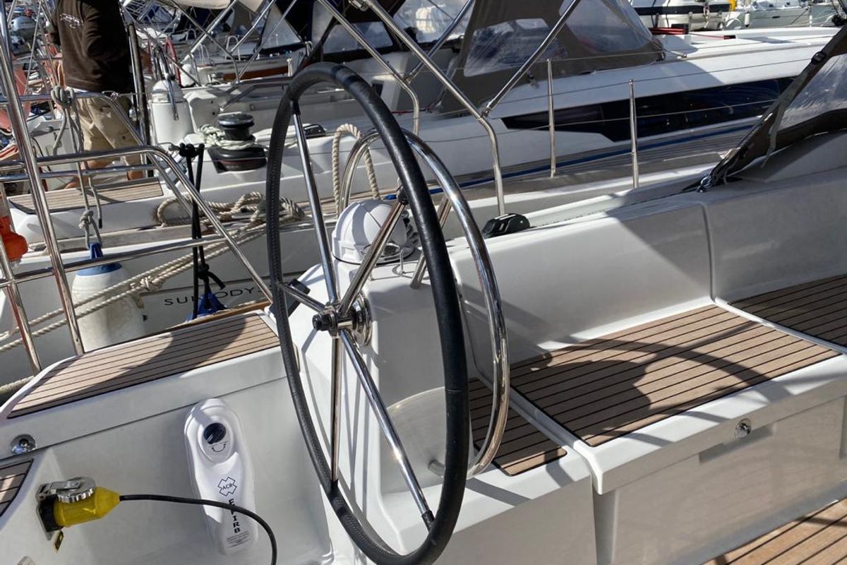 Cockpit of Alboran Pacharan (Cabo Verde), a Jeanneau Sun Odyssey 519 sailboat at Murdeira, Cape Verde