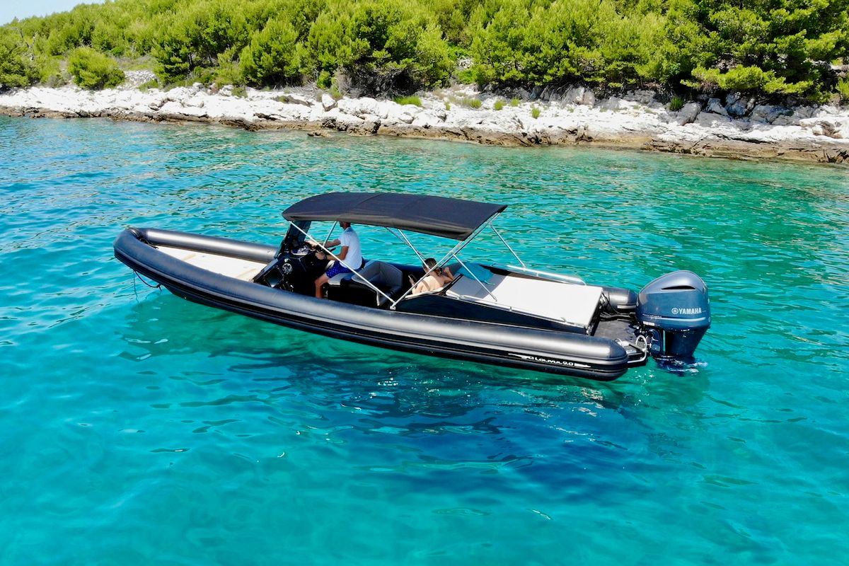 Exterior view of Lux, a Lolivul 9 motorboat at Grad Trogir, Croatia