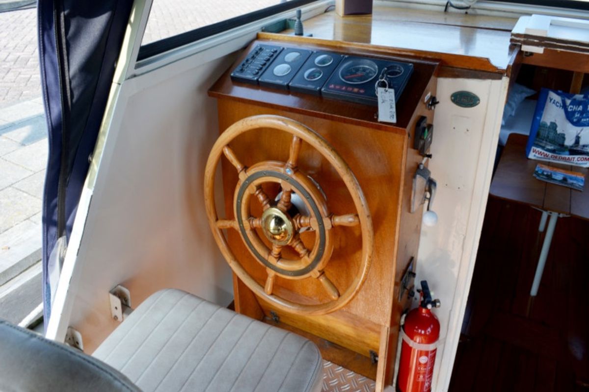 Cockpit of Quinto, a De Drait Doerak 850 OK motorboat at Drachten, Netherlands