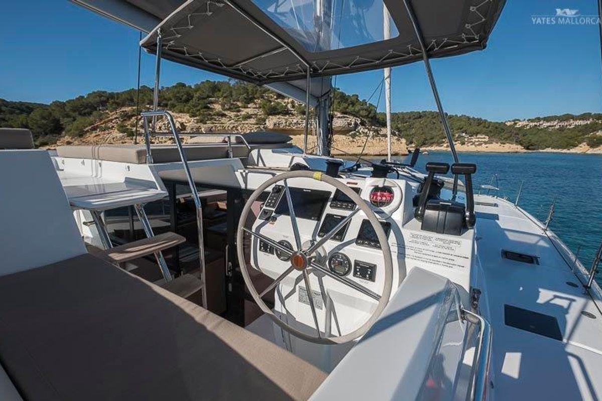 Cockpit of Aurora 381, a Fountaine Pajot Saona 47 catamaran at es Jonquet, Spain