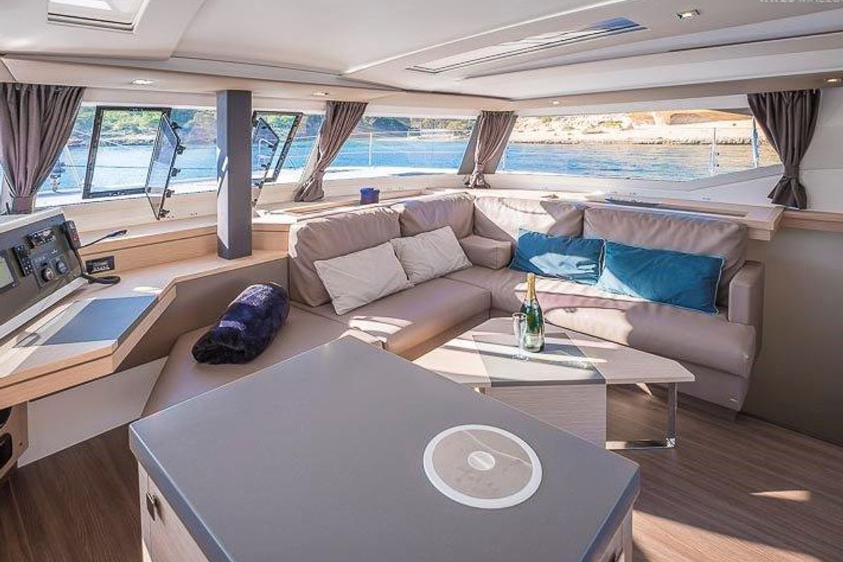 Salon of Aurora 381, a Fountaine Pajot Saona 47 catamaran at es Jonquet, Spain