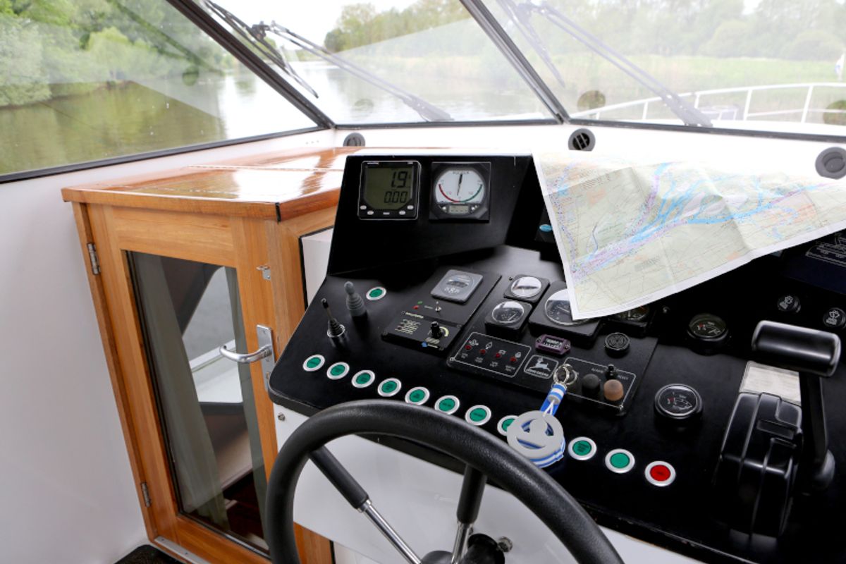 Cockpit of Royal, a Pacific Allure 155 motorboat at Heukelum, Netherlands
