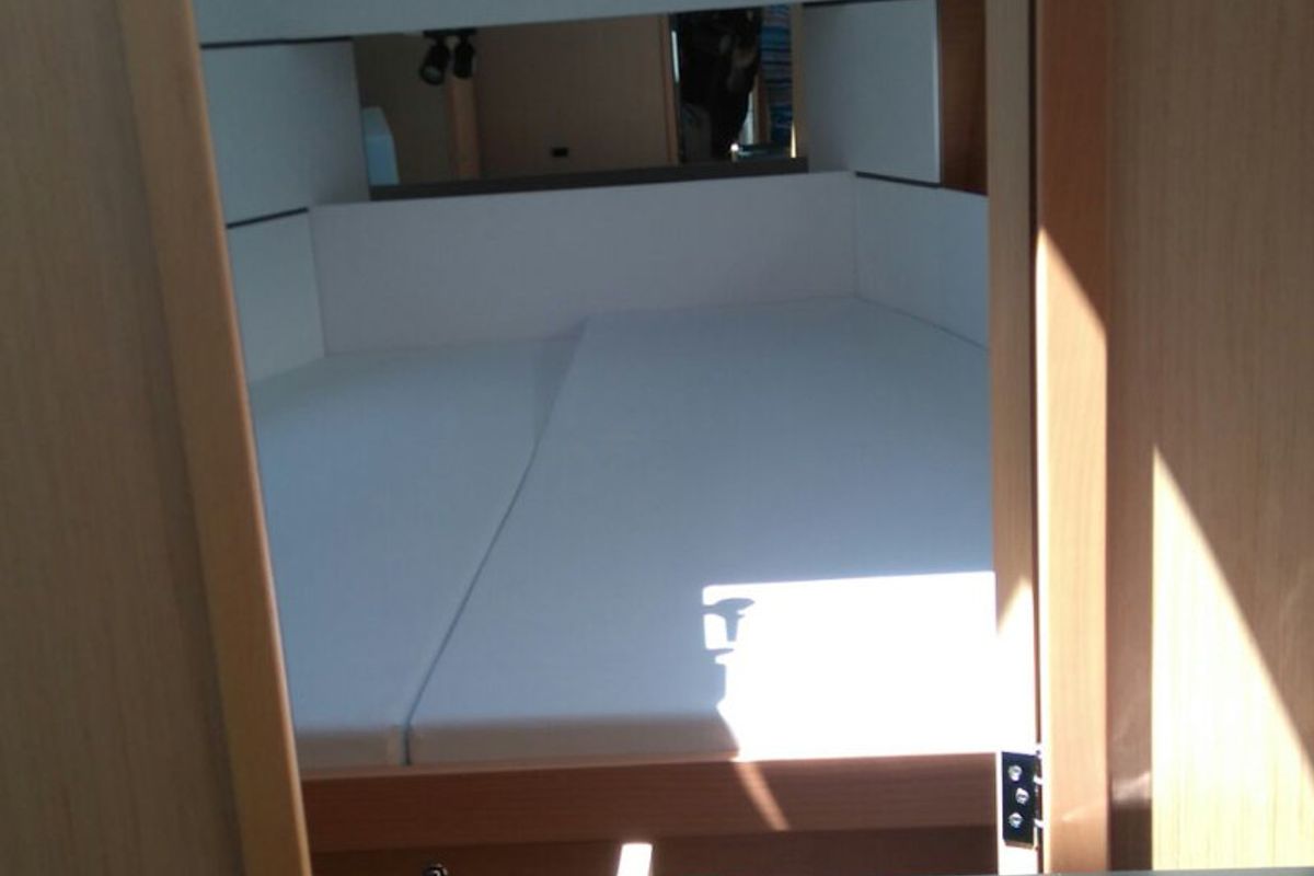 Cabin on Folie, a Beneteau Oceanis 38 sailboat at Procida, Italy