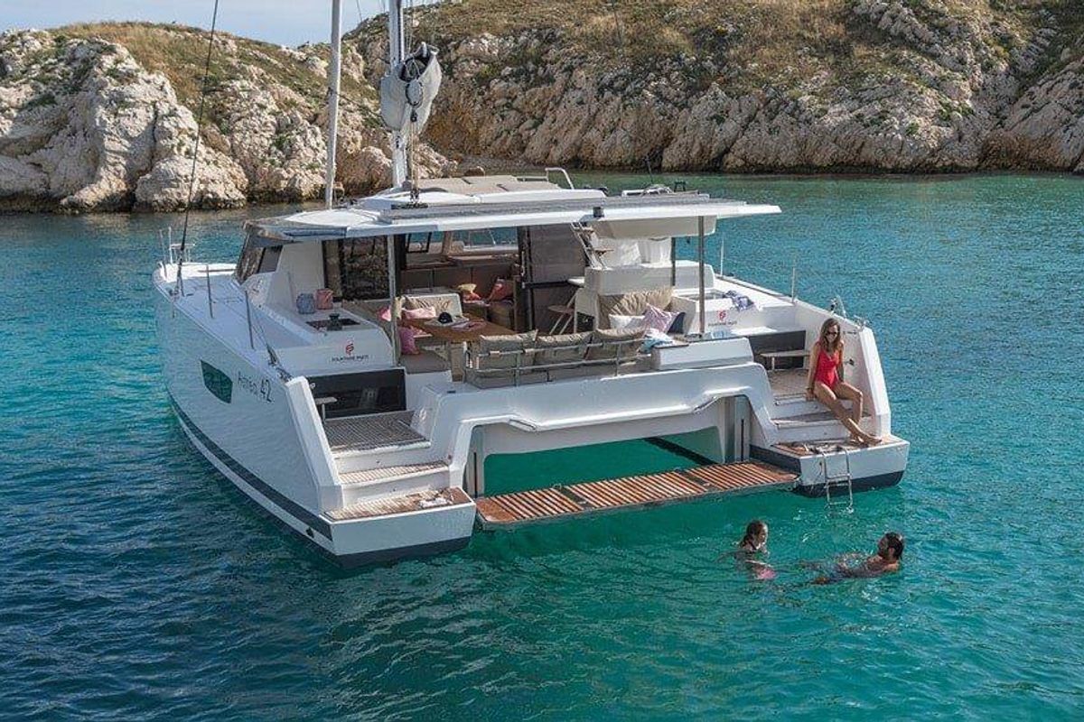 Exterior view of Fortunata, a Fountaine Pajot Astrea 42 catamaran at Road Town, British Virgin Islands