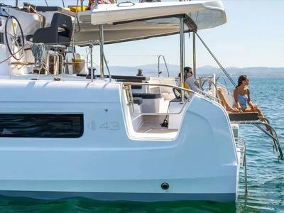 Exterior view of Olandese Volante, a Lagoon 43 catamaran at Olbia, Italy