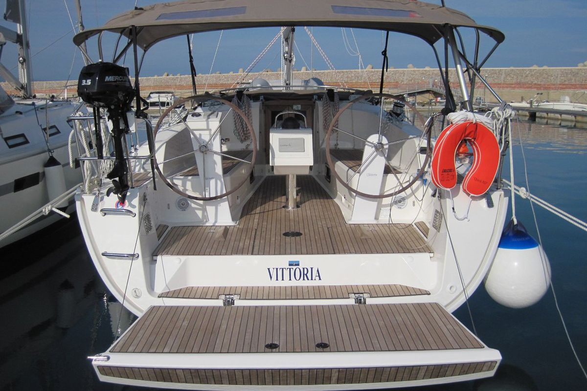 Exterior view of Vittoria, a Bavaria Cruiser 41 sailboat at Capo d'Orlando, Italy