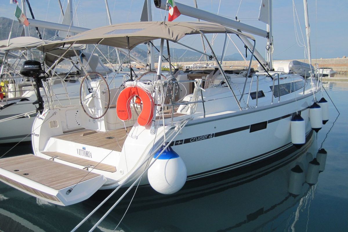 Exterior view of Vittoria, a Bavaria Cruiser 41 sailboat at Capo d'Orlando, Italy