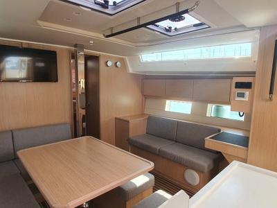 Salon of Whisper, a Bavaria C45 sailboat at Cala Egos, Spain