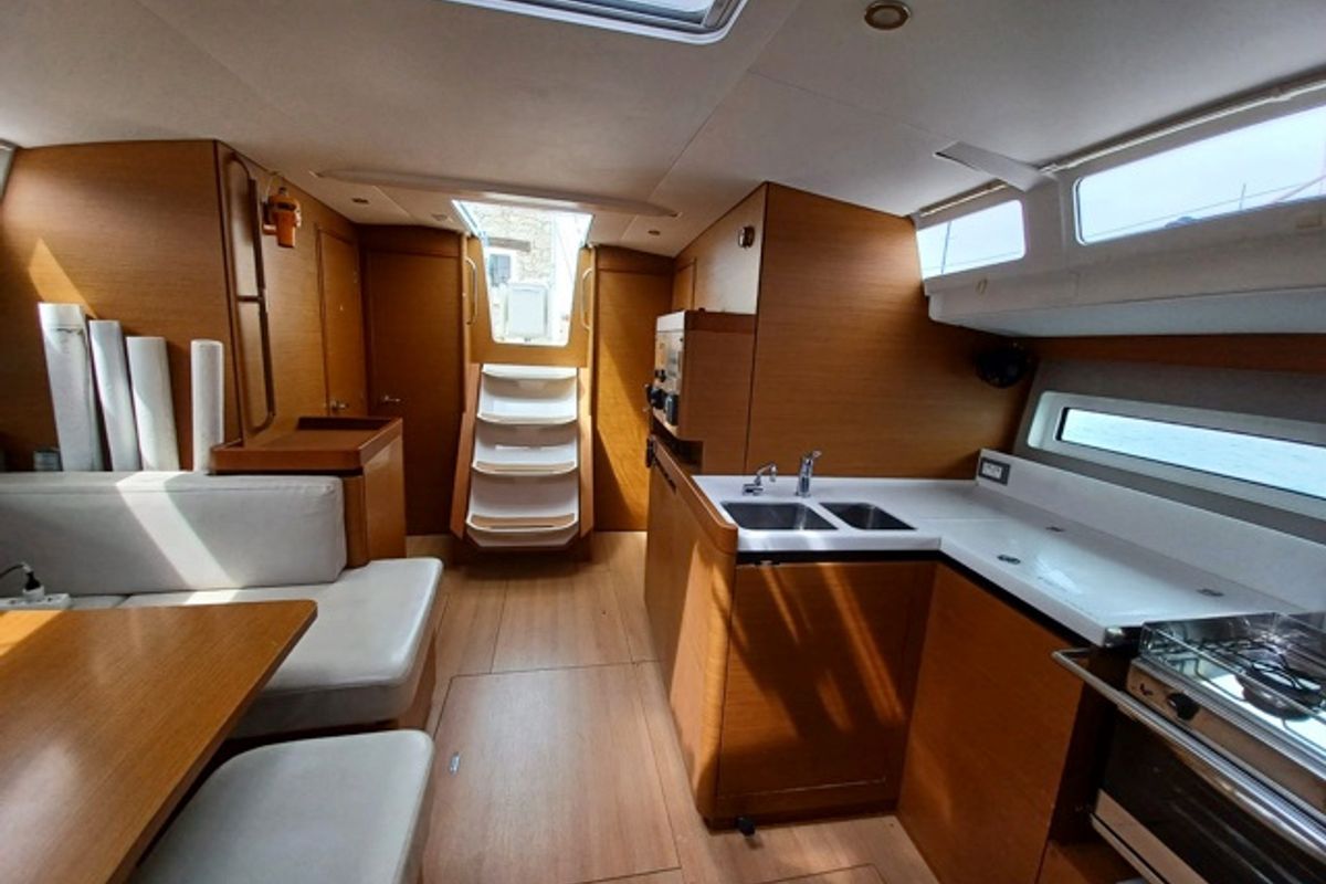 Salon of Cloe I, a Jeanneau Sun Odyssey 490 sailboat at Olbia, Italy