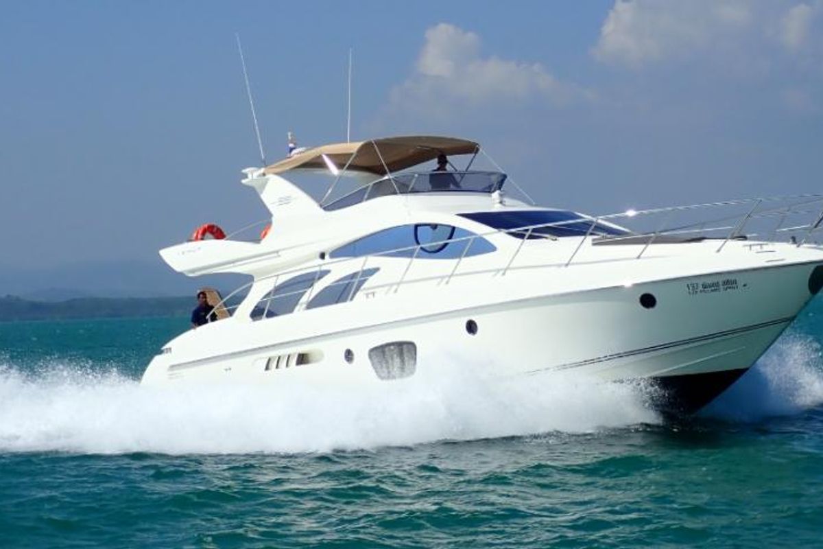 Exterior view of Pillars, a Azimut 55 Fly yacht at Mai Khao, Thailand