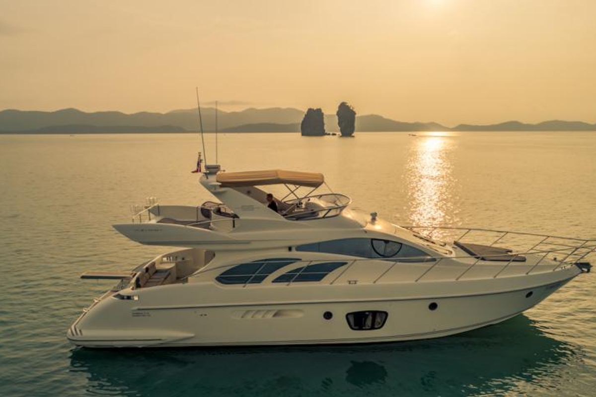 Exterior view of Pillars, a Azimut 55 Fly yacht at Mai Khao, Thailand