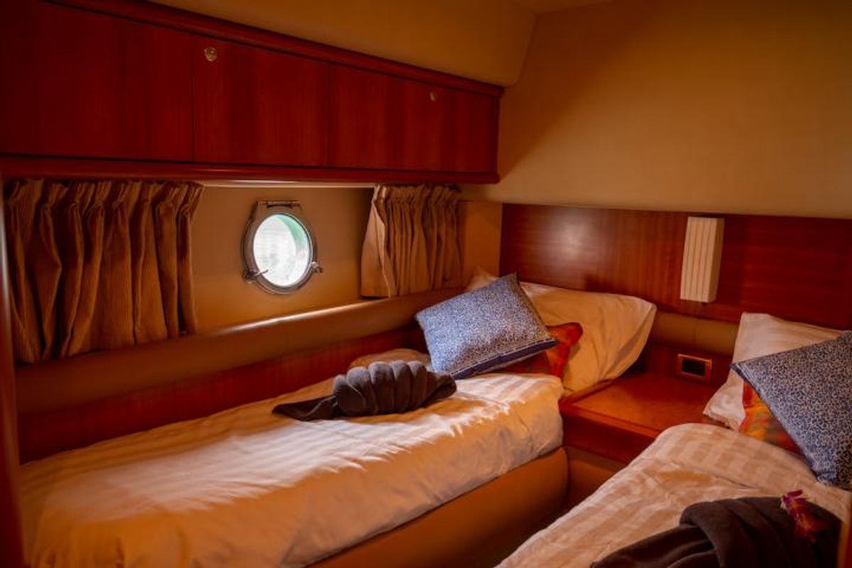 Cabin on Pillars, a Azimut 55 Fly yacht at Mai Khao, Thailand
