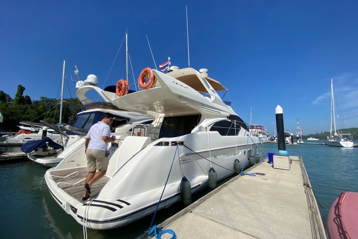 Exterior view of Pillars, a Azimut 55 Fly yacht at Mai Khao, Thailand