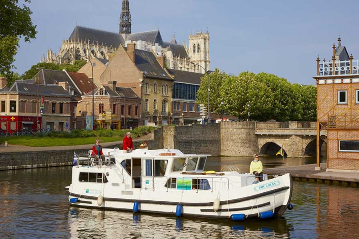 Exterior view of 1180-14, a Pénichette 1180 motorboat at Scey-sur-Saône-et-Saint-Albin, France