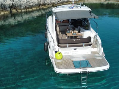 Smiley, a Bavaria 33 Sport HT motorboat at Punat, Croatia