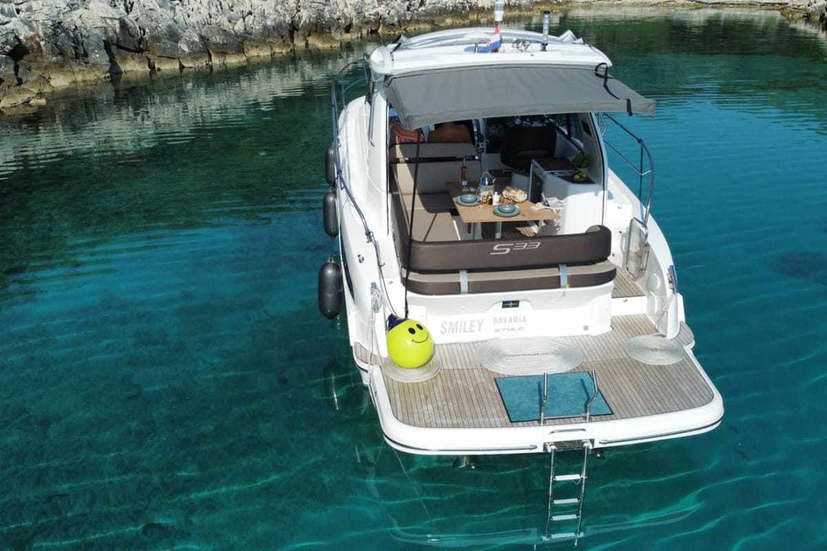 Smiley, a Bavaria 33 Sport HT motorboat at Punat, Croatia