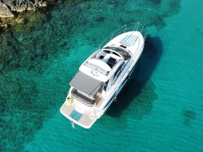 Smiley, a Bavaria 33 Sport HT motorboat at Punat, Croatia