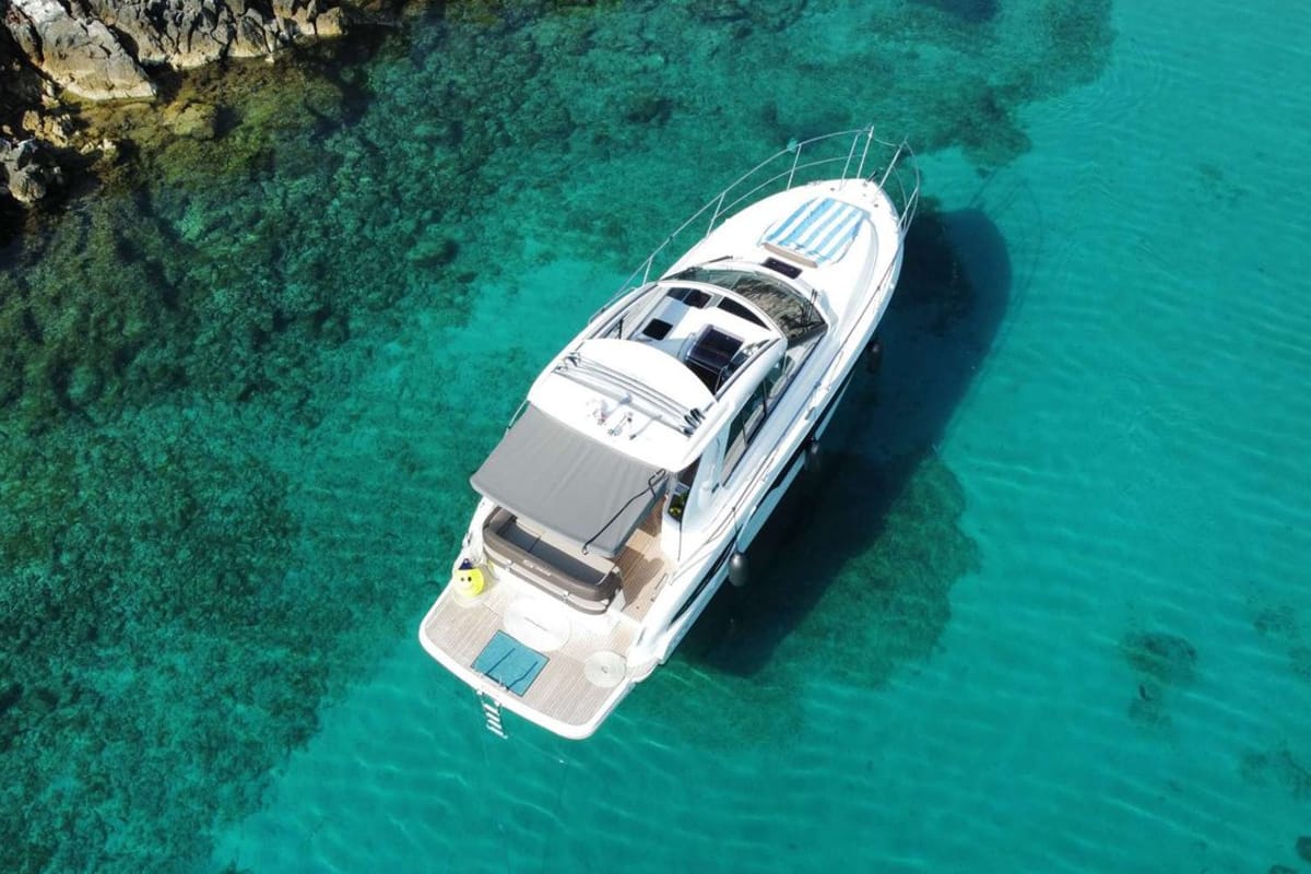 Smiley, a Bavaria 33 Sport HT motorboat at Punat, Croatia