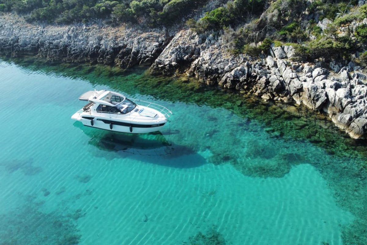 Smiley, a Bavaria 33 Sport HT motorboat at Punat, Croatia