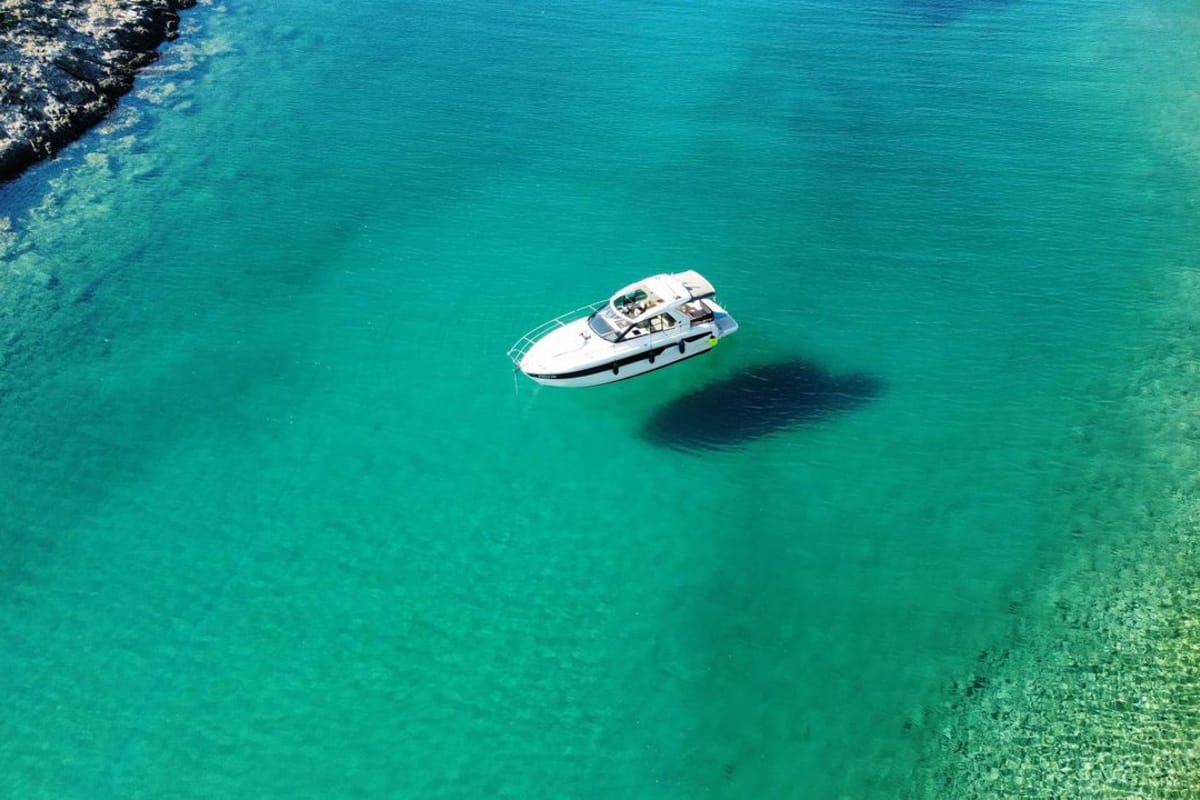 Smiley, a Bavaria 33 Sport HT motorboat at Punat, Croatia