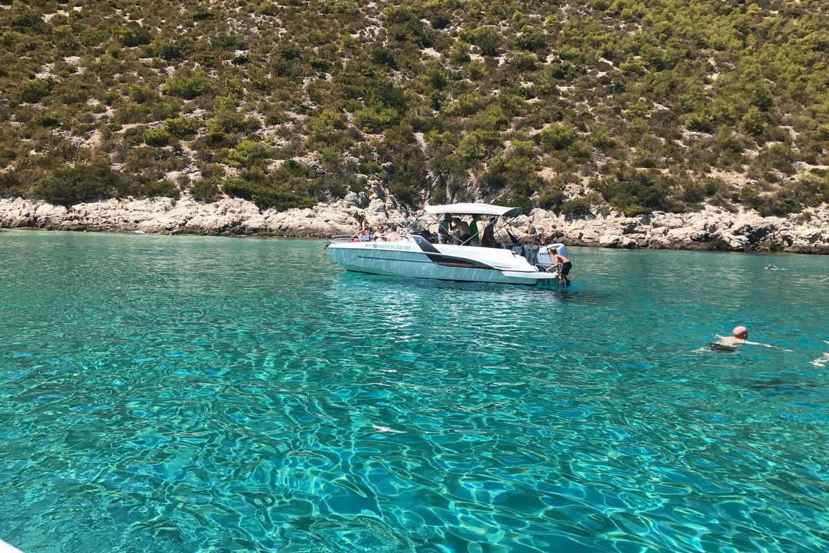 Exterior view of SPACEDeck, a Beneteau Flyer 7.7 SUNdeck motorboat at Grad Trogir, Croatia