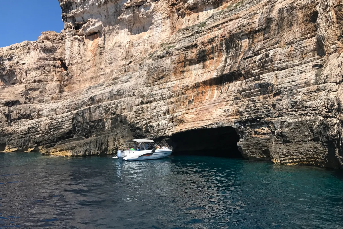 Exterior view of SPACEDeck, a Beneteau Flyer 7.7 SUNdeck motorboat at Grad Trogir, Croatia