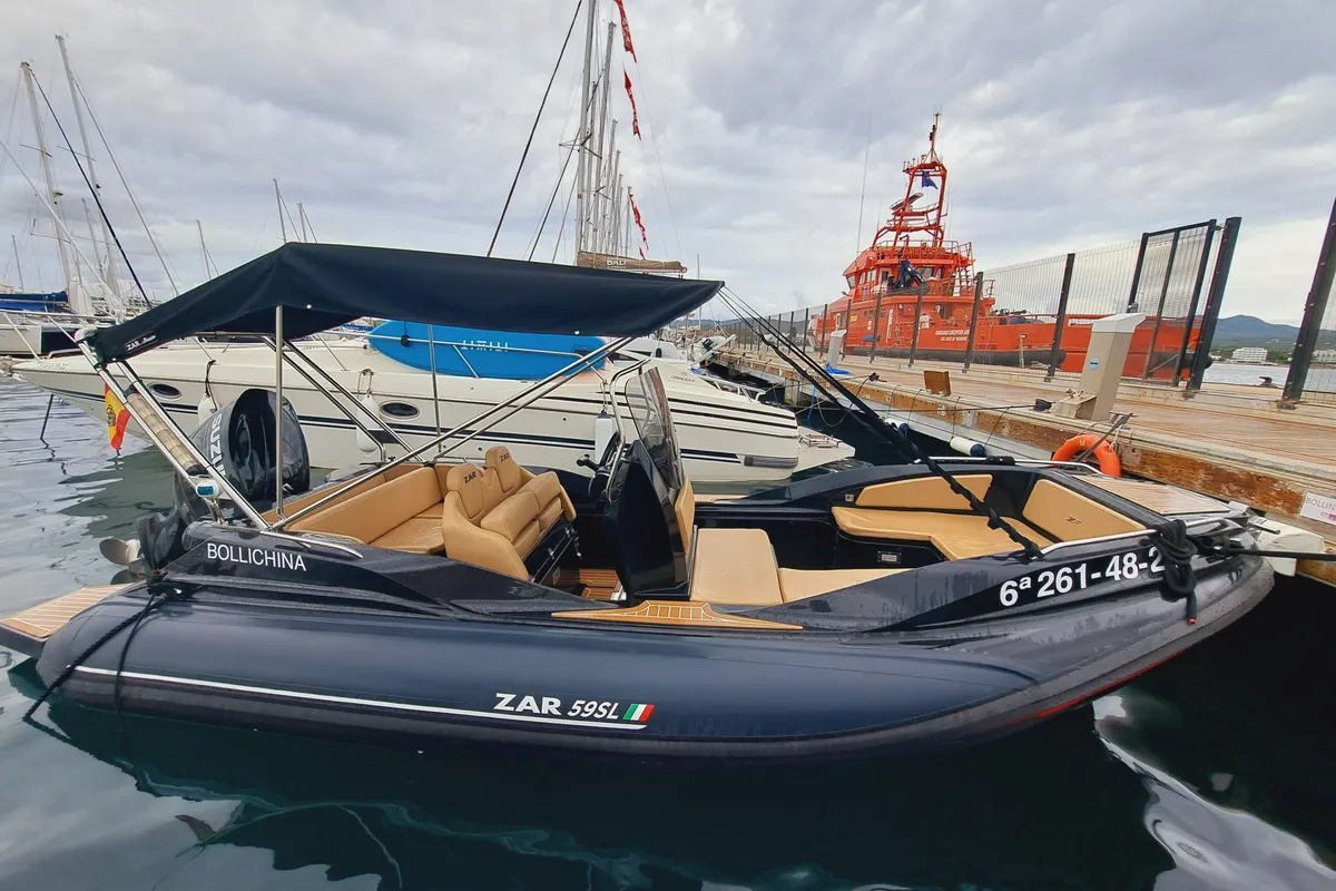 Exterior view of BOLLICHINA, a Zar 59 SL motorboat at Sant Antoni de Portmany, Spain