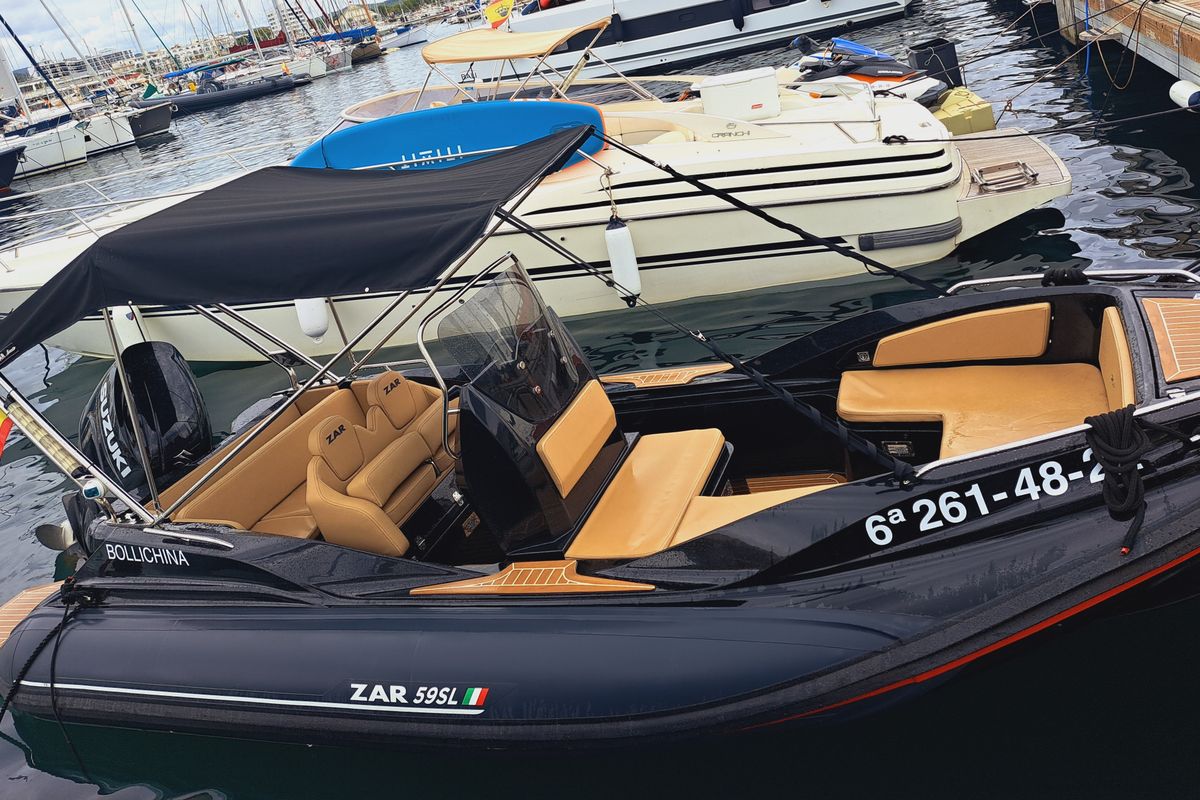 Exterior view of BOLLICHINA, a Zar 59 SL motorboat at Sant Antoni de Portmany, Spain