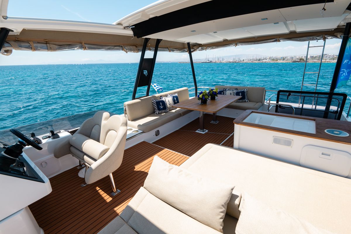 Cockpit of Premium, a Fountaine Pajot MY6 catamaran at Municipal Unit of Apollonioi, Greece