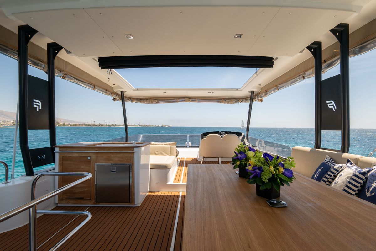 Deck of Premium, a Fountaine Pajot MY6 catamaran at Municipal Unit of Apollonioi, Greece