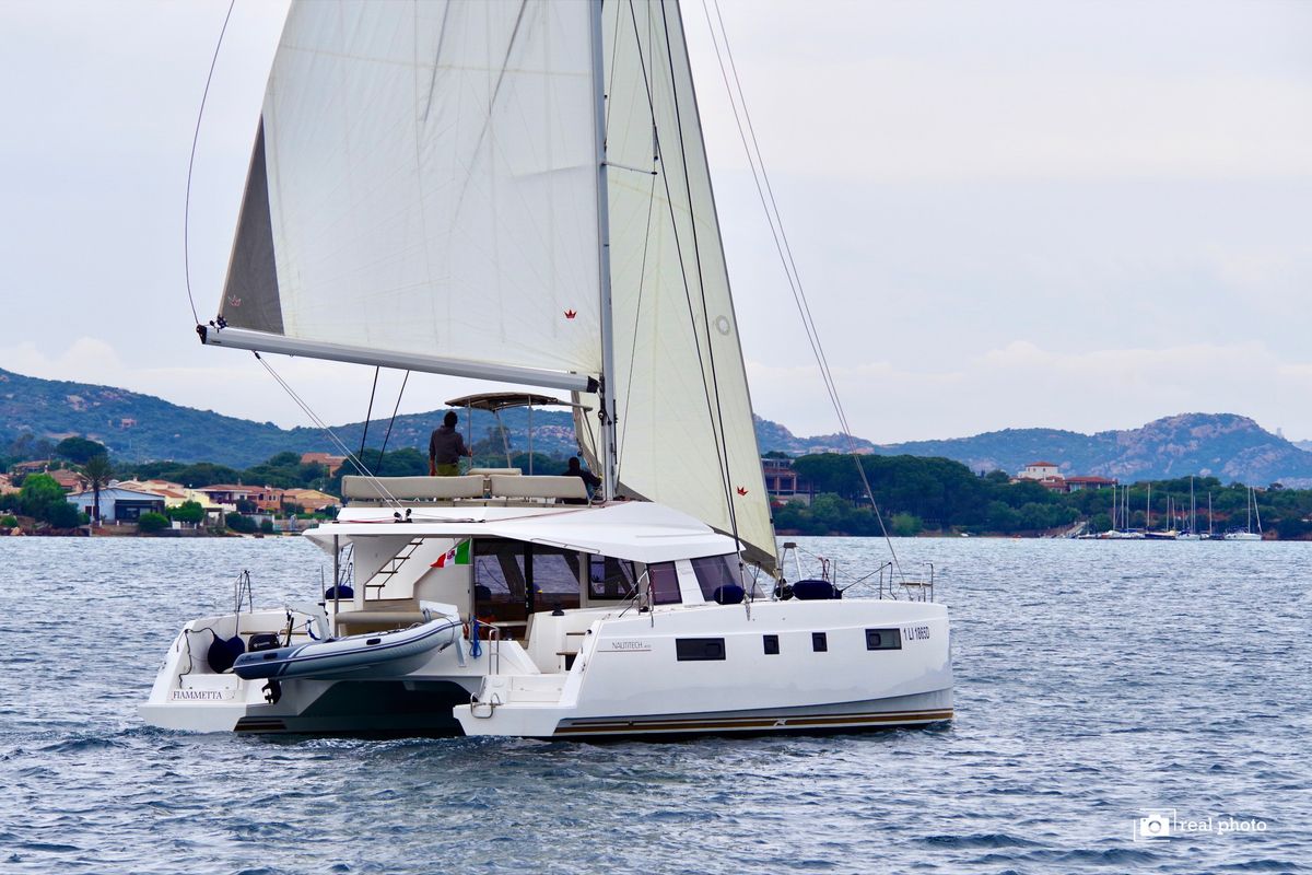 Exterior view of Fiammetta, a Nautitech 46 Fly catamaran at Cannigione, Italy