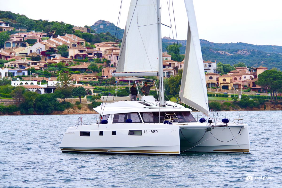 Exterior view of Fiammetta, a Nautitech 46 Fly catamaran at Cannigione, Italy