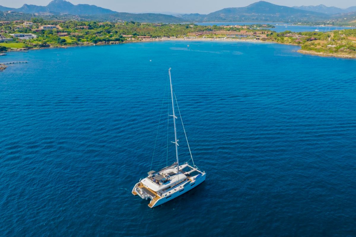 Exterior view of The Sun, a Lagoon 620 catamaran at Olbia, Italy