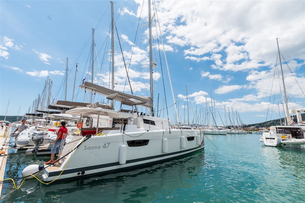 Exterior view of Sunny Wave, a Fountaine Pajot Saona 47 Quintet catamaran at Seget Donji, Croatia