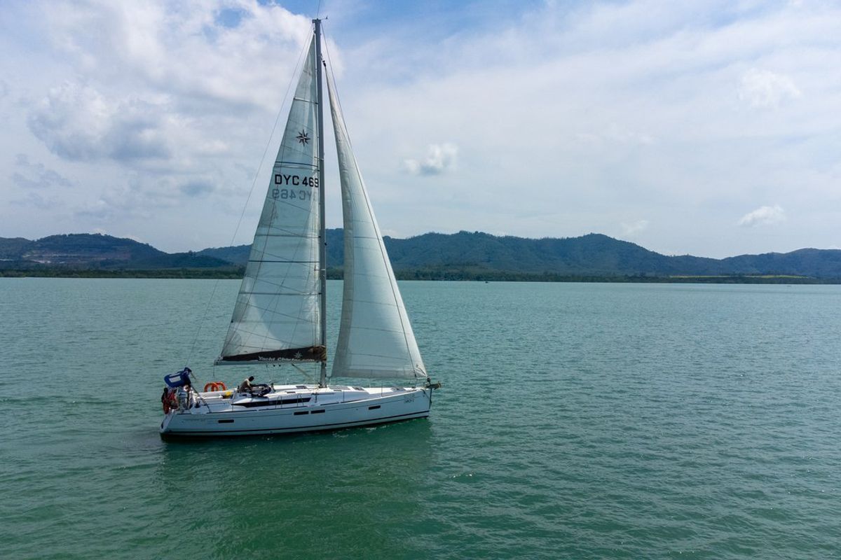 Exterior view of Aurora Belle, a Jeanneau Sun Odyssey 469 sailboat at Mai Khao, Thailand