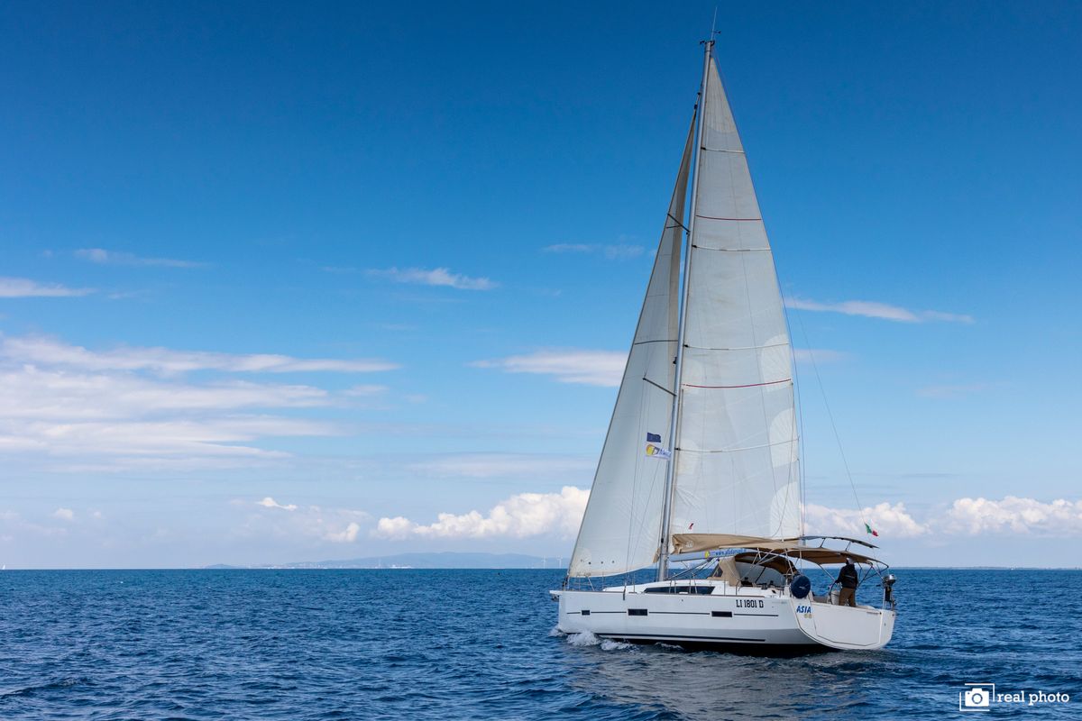 Exterior view of Asia - Solar Panel, a Dufour 460 Grand Large sailboat at Puntone di Scarlino, Italy