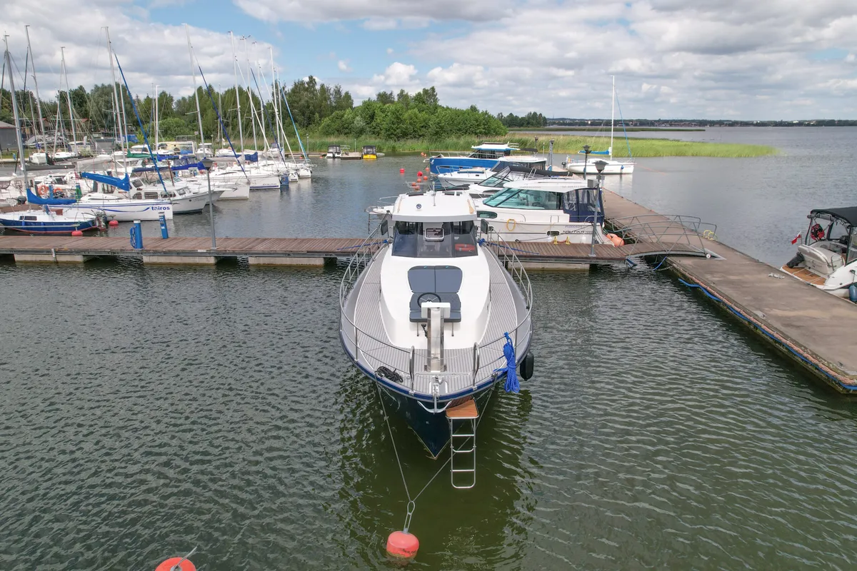 Exterior view of Nautika 1300 Royal, a Delphia Yachts Nautika 1300  motorboat at Wilkasy, Poland