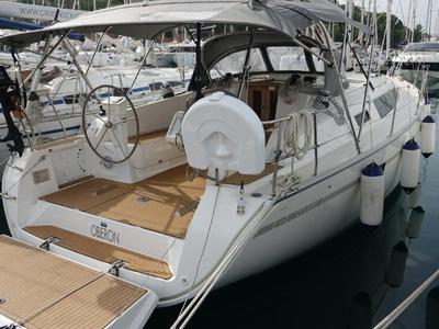 Exterior view of Oberon, a Bavaria Cruiser 41 sailboat at Olbia, Italy