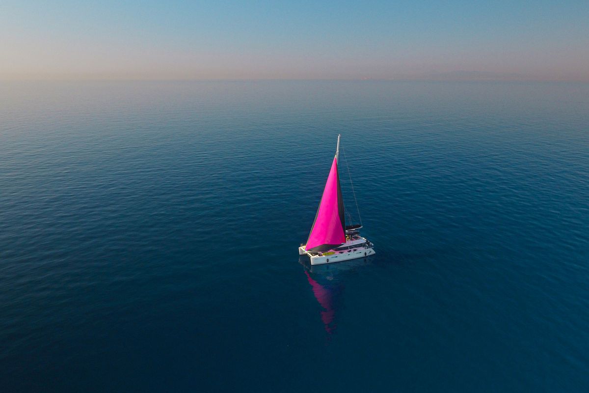 Exterior view of Avra, a Lagoon 560 S2 catamaran at Athens, Greece