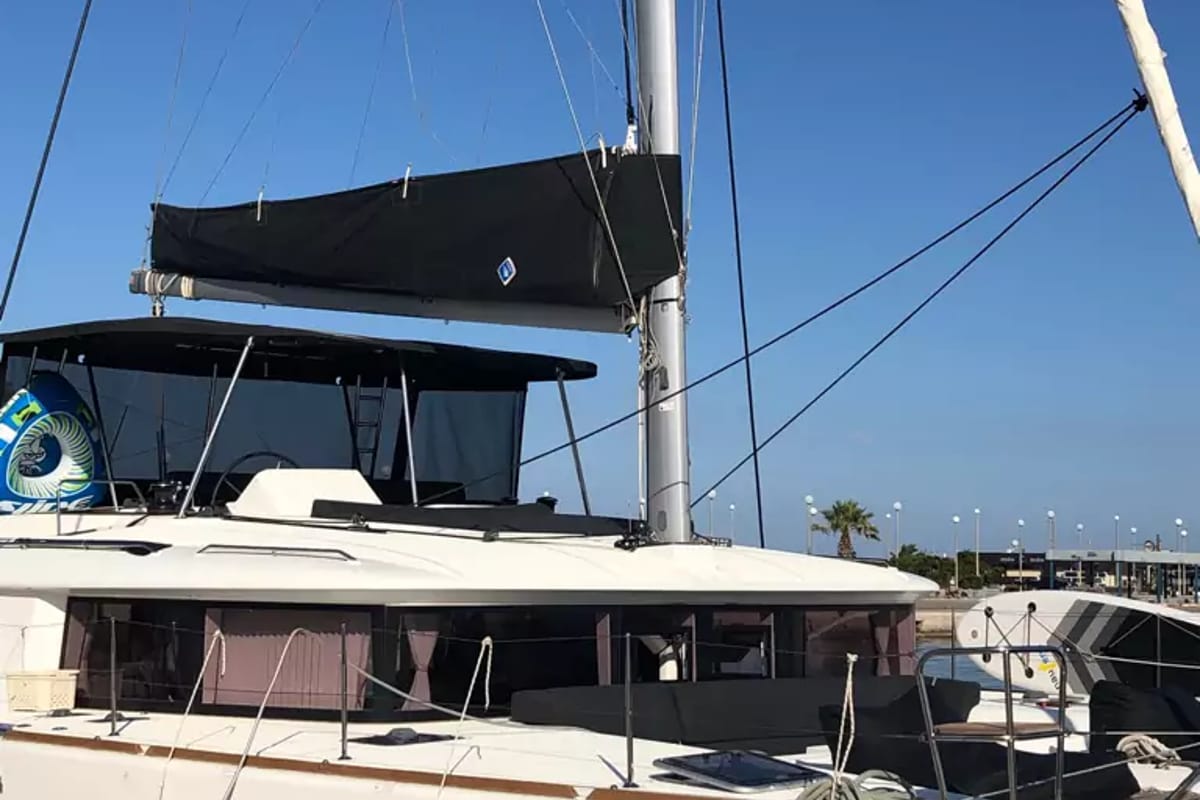 Exterior view of EVI, a Lagoon 450 F catamaran at Kontokali, Greece